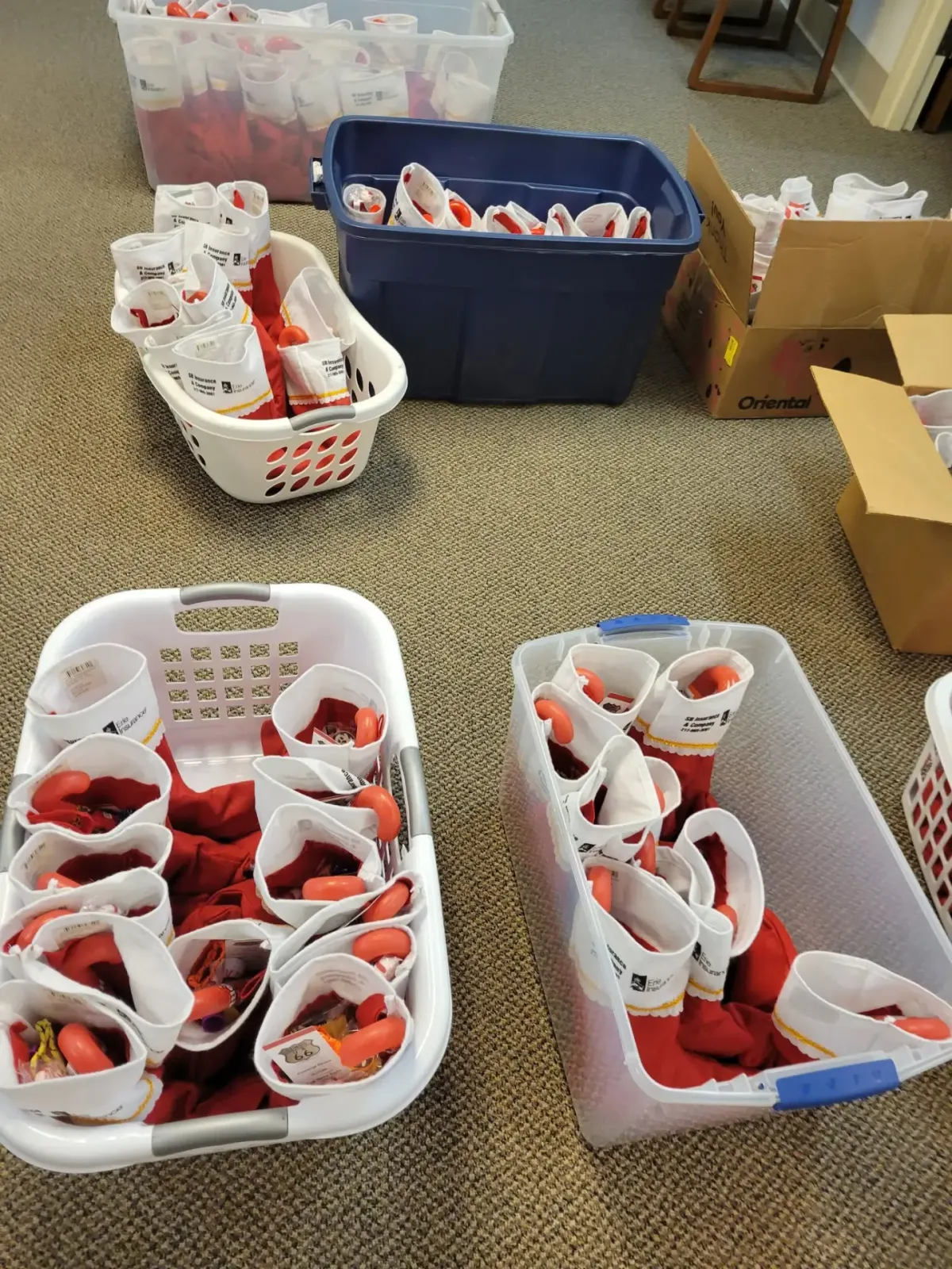 SB Insurance volunteers preparing stockings for local children